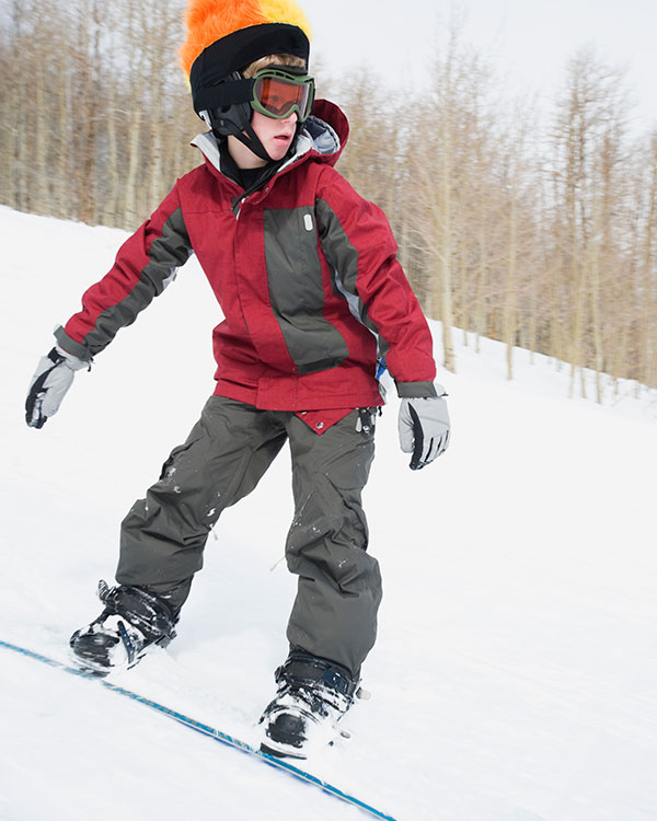 A child snowboarding 