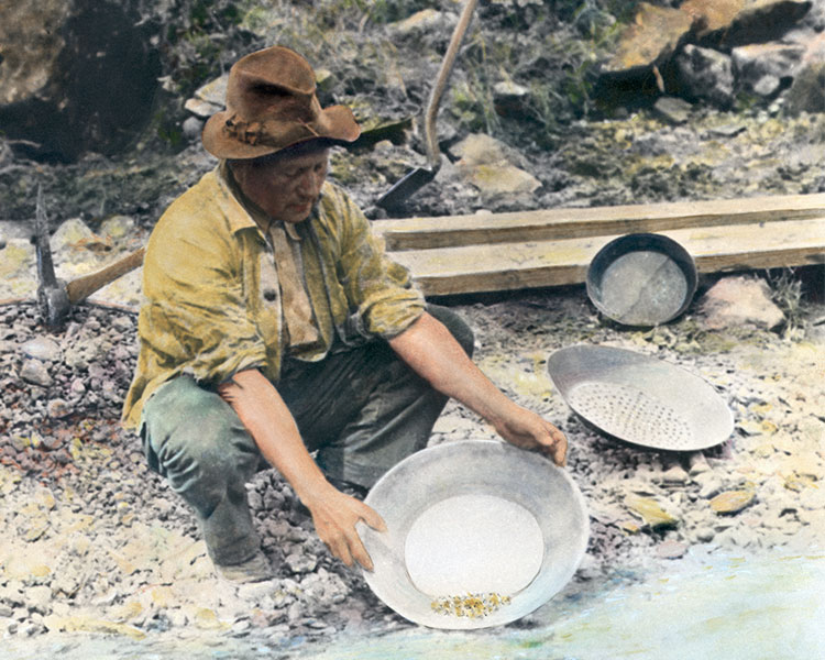 Image of a person mining for gold