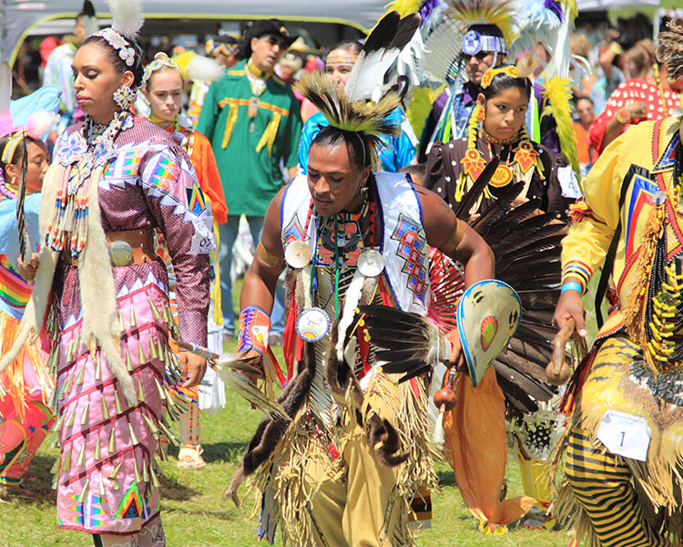 People dressed in colorful traditional clothing