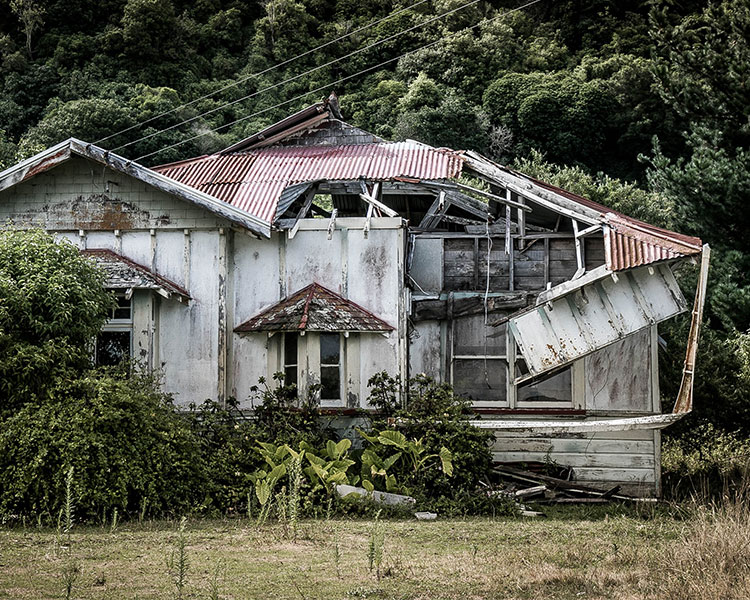 Image of an abandoned building falling apart