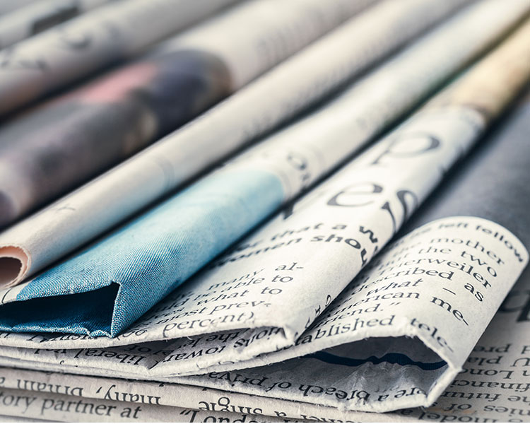 Image of a stack of newspapers