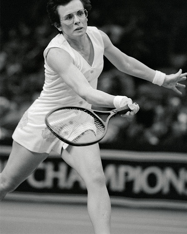 Black & white photo of Sally Ride playing tennis