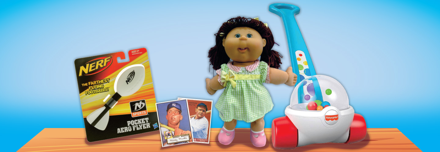 Image of a variety of older toys like Nerf ball, Cabbage patch doll, & baseball cards