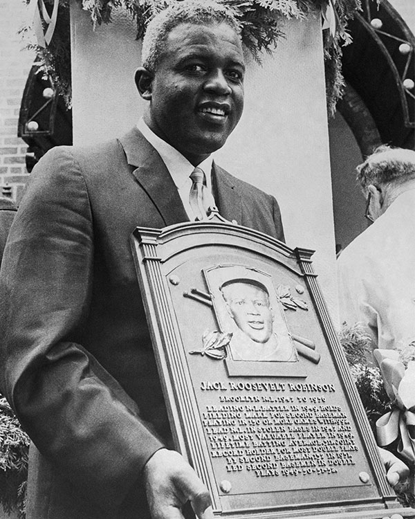 Black & white photo of Jack Roosevelt Robinson receiving an award